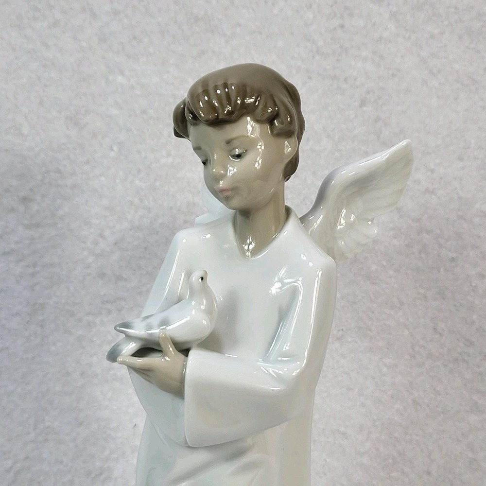 NAO by Lladro Protecting Angel Boy with Dove Porcelain  Figurine #1261